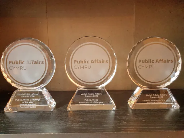 Three round engraved crystal awards with the Public Affairs Cymru logo for the Welsh Public Affairs Awards 2020