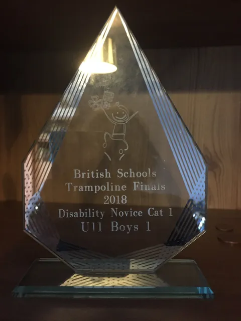 Jade glass diamond award engraved with a trampolining logo for the British Schools Trampoline Finals 2018